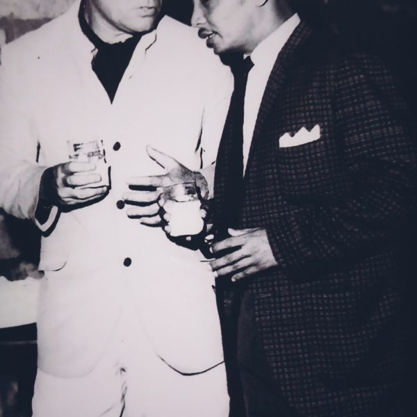 Enrique Zobel with His Highness Tenglar Mahkota of Pahang, Malaysia, during after-games cocktails in 1968.
