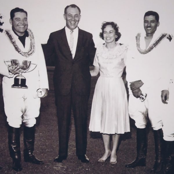 Beling and her husband, Jose Cajucom Jr. (to her left) with his fellow polo players.